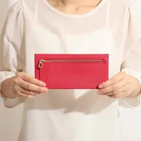 ピンク レザー 長財布 エンボス加工プラピカネ COACH ピンク 長財布 エンボス加工 - メルカリ