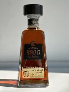 世界最高峰テキーラ「クエルボ1800 アネホ」名入れ彫刻ボトル｜高級